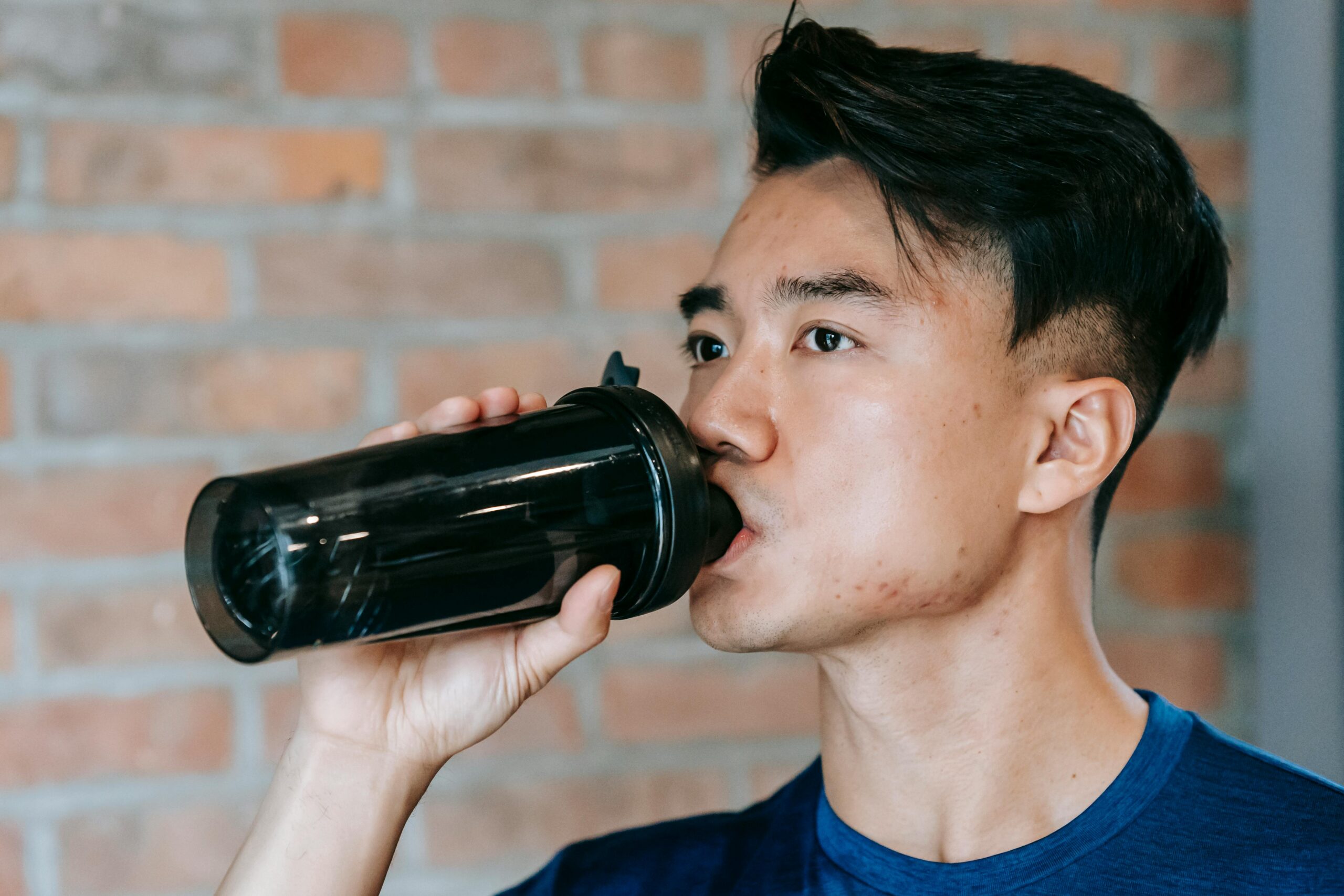 Kostenloses Stock Foto zu aktiv, asiatischer mann, athlet